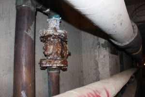 Deferred maintenance - leaking and corroded pipe 